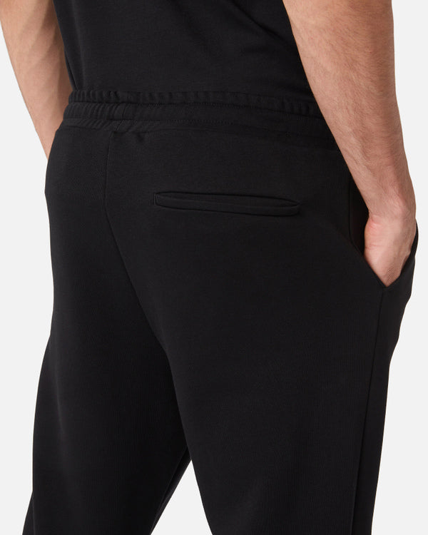 Black joggers with zip and logo